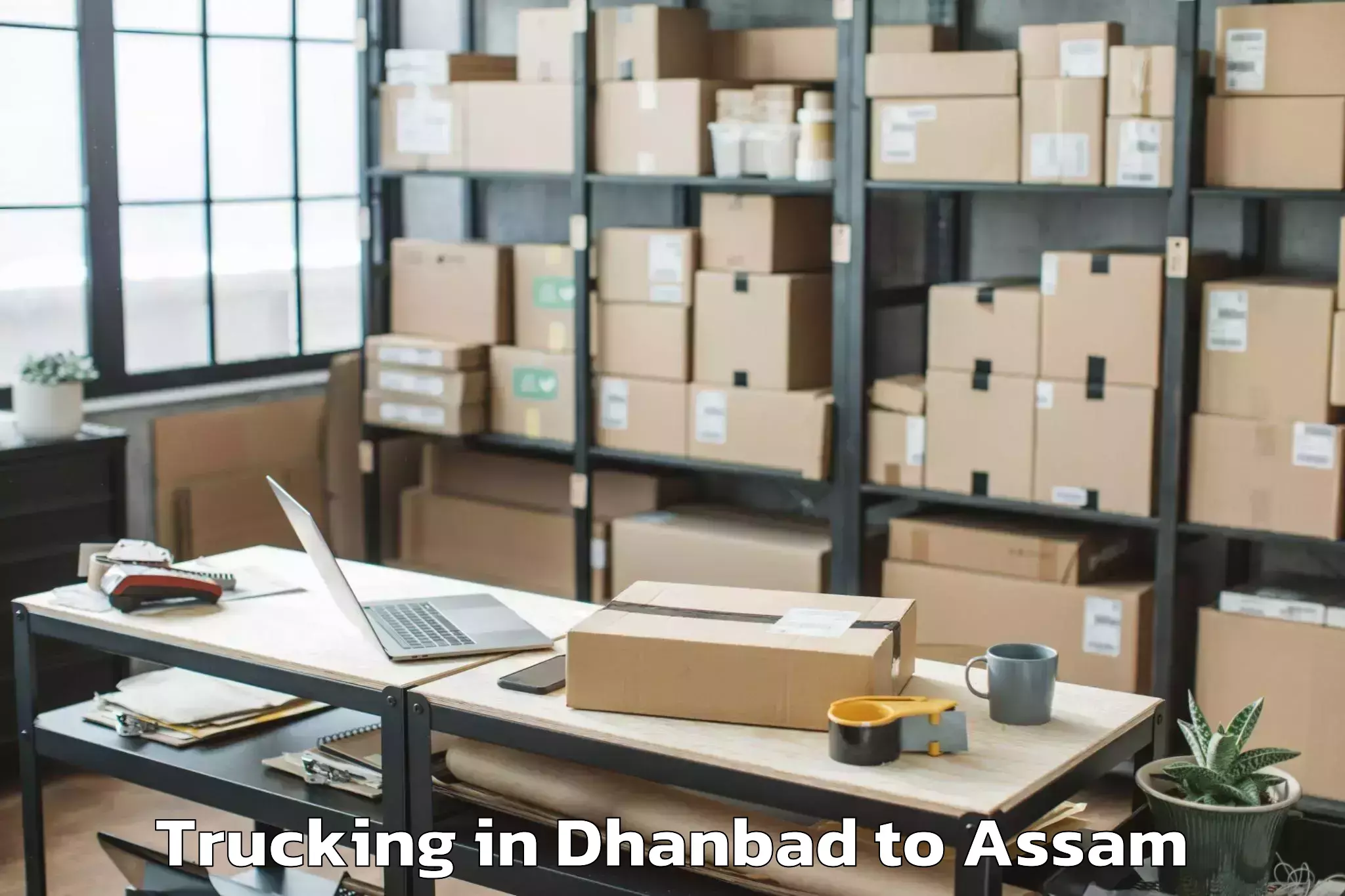 Easy Dhanbad to Azara Trucking Booking